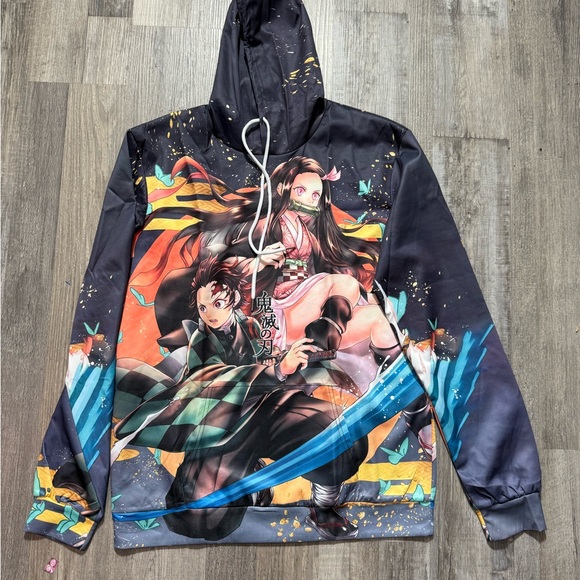 Other - Vibrant Black and Orange Sweater with Anime-Inspired Design RUIKER Sudadera